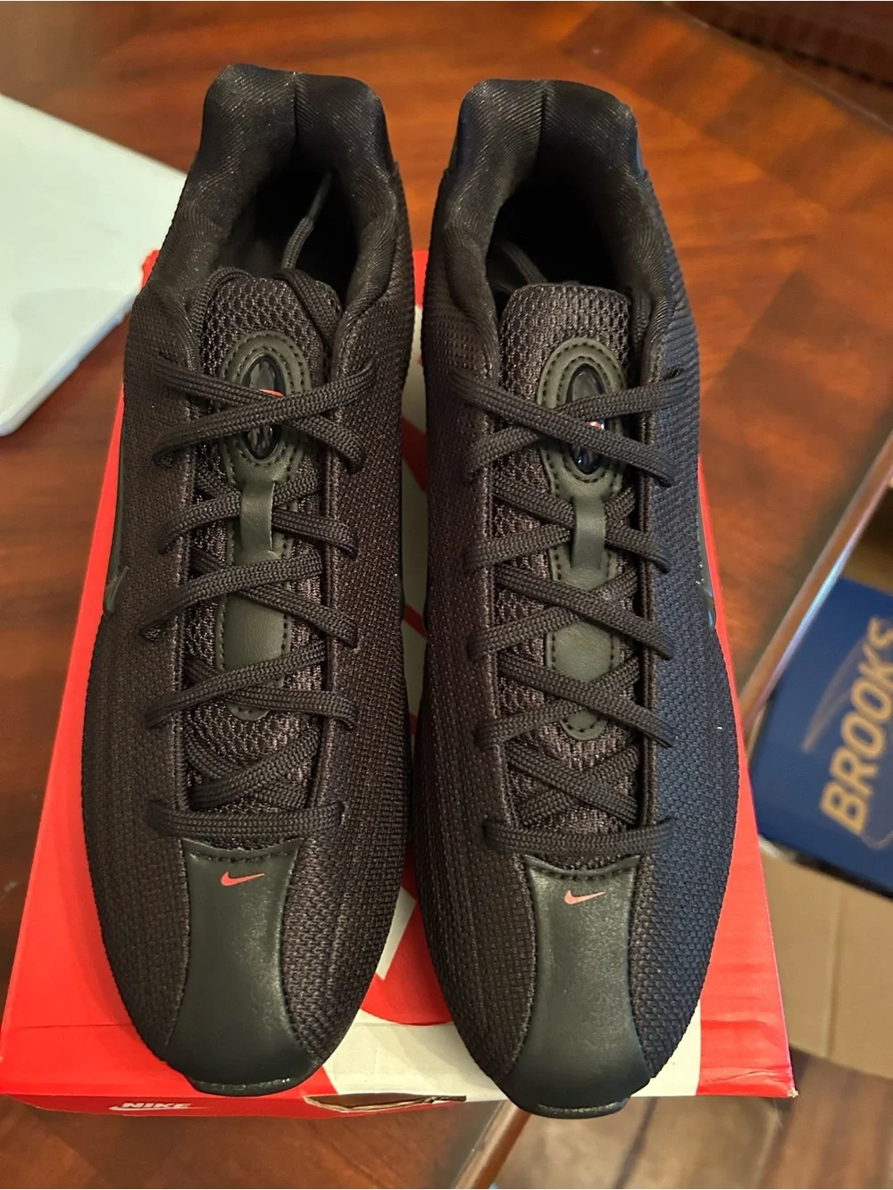 Nike Women’s Black Athletic Shoes with Red Accents